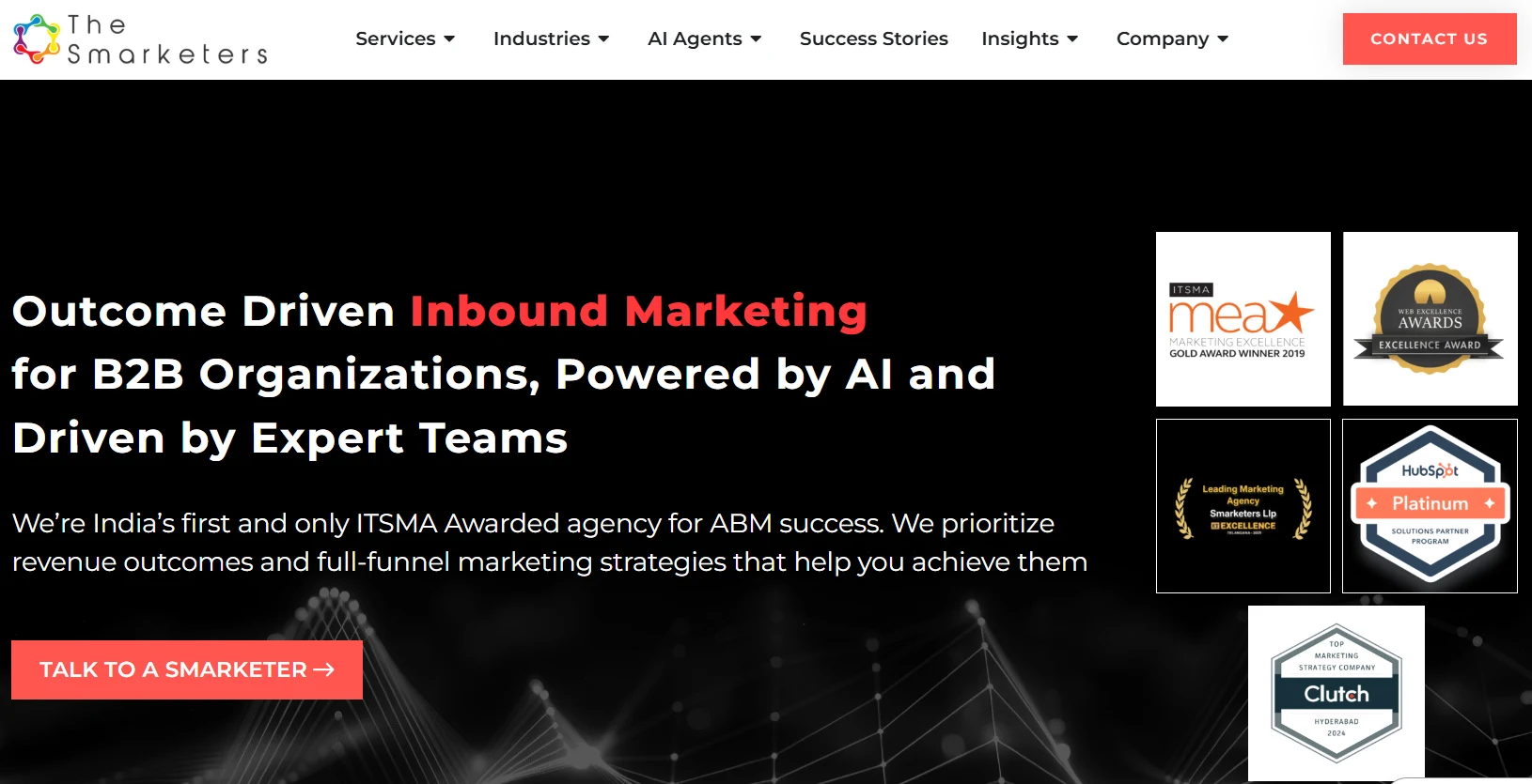Homepage of The Smarketers highlighting AI-powered inbound marketing for B2B organizations, with industry awards, HubSpot Platinum Partner badge, and a call-to-action to contact the team.